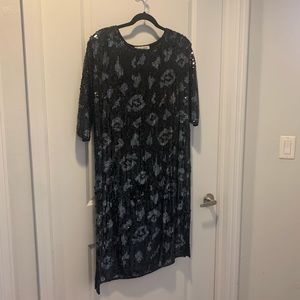 Vintage sequin dress. Half sleeves with animal like print.
